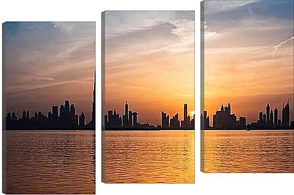 Модульная картина - Вид на вечерний город на отдалении. Дубай