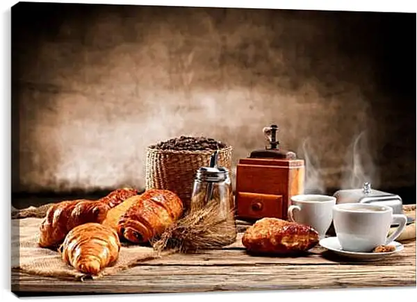 Постер на подрамнике - Несколько круассанов и пару чашек кофе на столе. Утреннее наслаждение.