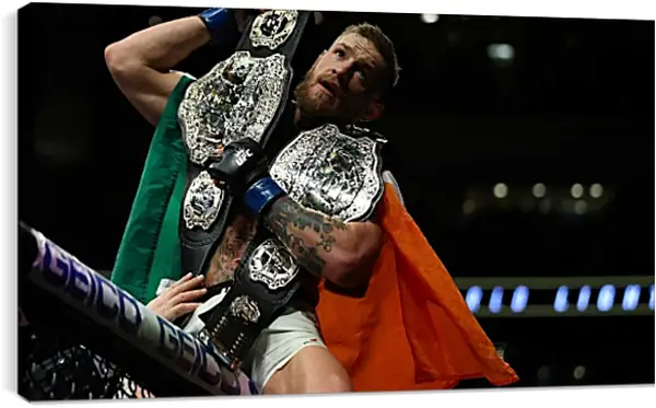 Постер на подрамнике - UFC. MMA. Конор МакГрегор с поясами. Постер на подрамнике - UFC. MMA. Конор МакГрегор с поясами.