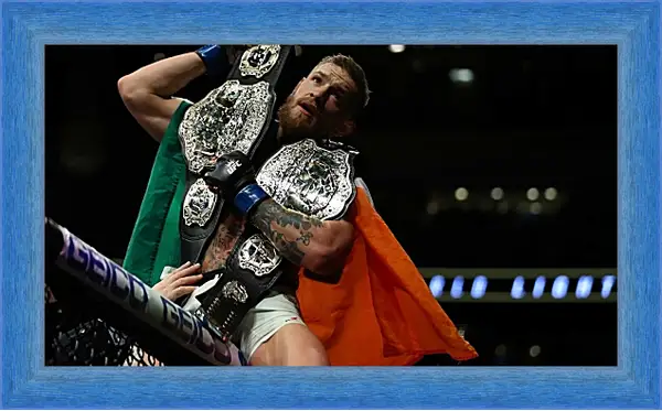 Картина в раме - UFC. MMA. Конор МакГрегор с поясами. Картина в раме - UFC. MMA. Конор МакГрегор с поясами.