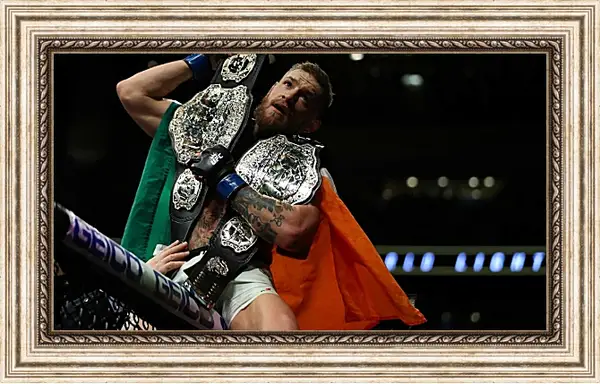 Картина в раме - UFC. MMA. Конор МакГрегор с поясами. Картина в раме - UFC. MMA. Конор МакГрегор с поясами.