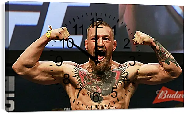 Часы картина - UFC. MMA. Конор МакГрегор демонстрирует мышцы. Часы картина - UFC. MMA. Конор МакГрегор демонстрирует мышцы.