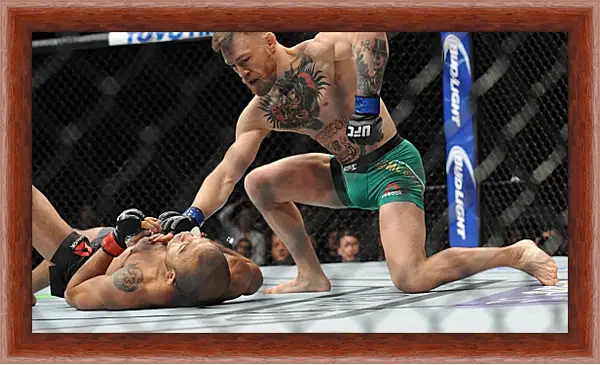 Картина в раме - UFC. MMA. Конор МакГрегор в бою. Картина в раме - UFC. MMA. Конор МакГрегор в бою.