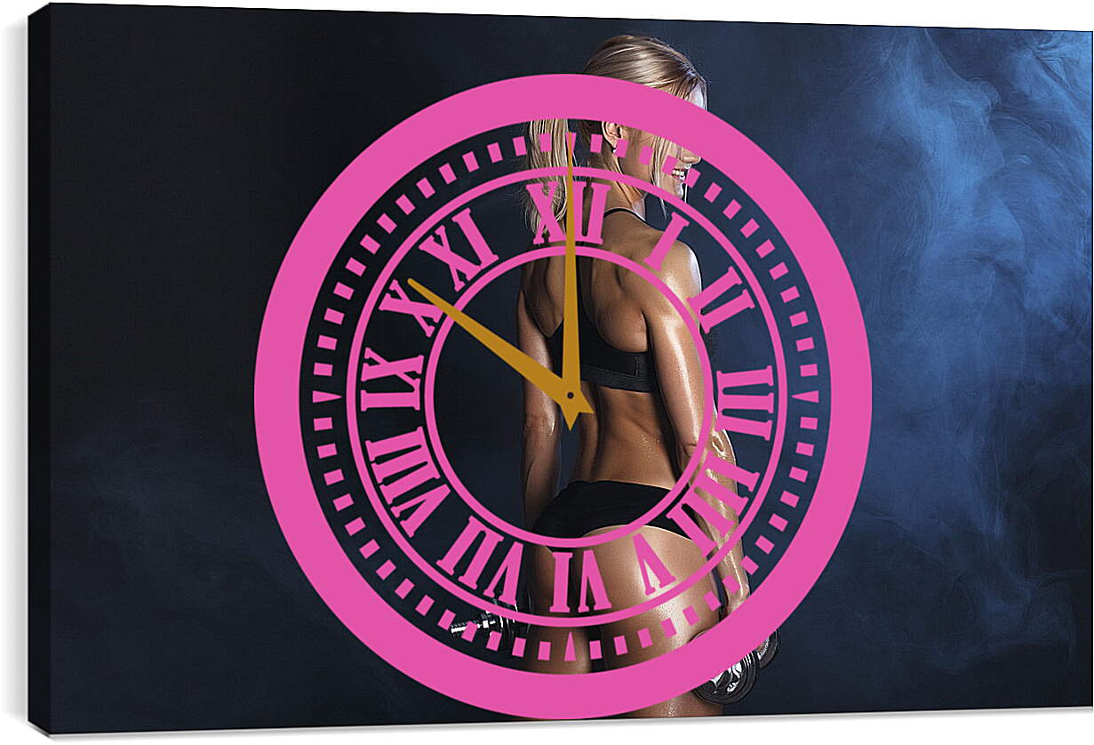 Часы картина - Блондинка стоит полубоком с двумя гантелями