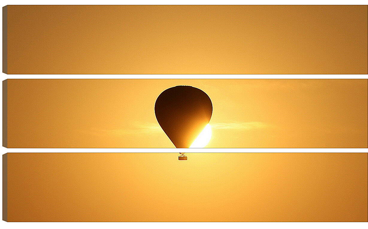 Модульная картина - Воздушный шар прикрывший солнце