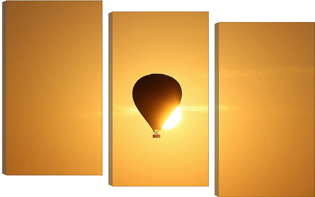 Модульная картина - Воздушный шар прикрывший солнце