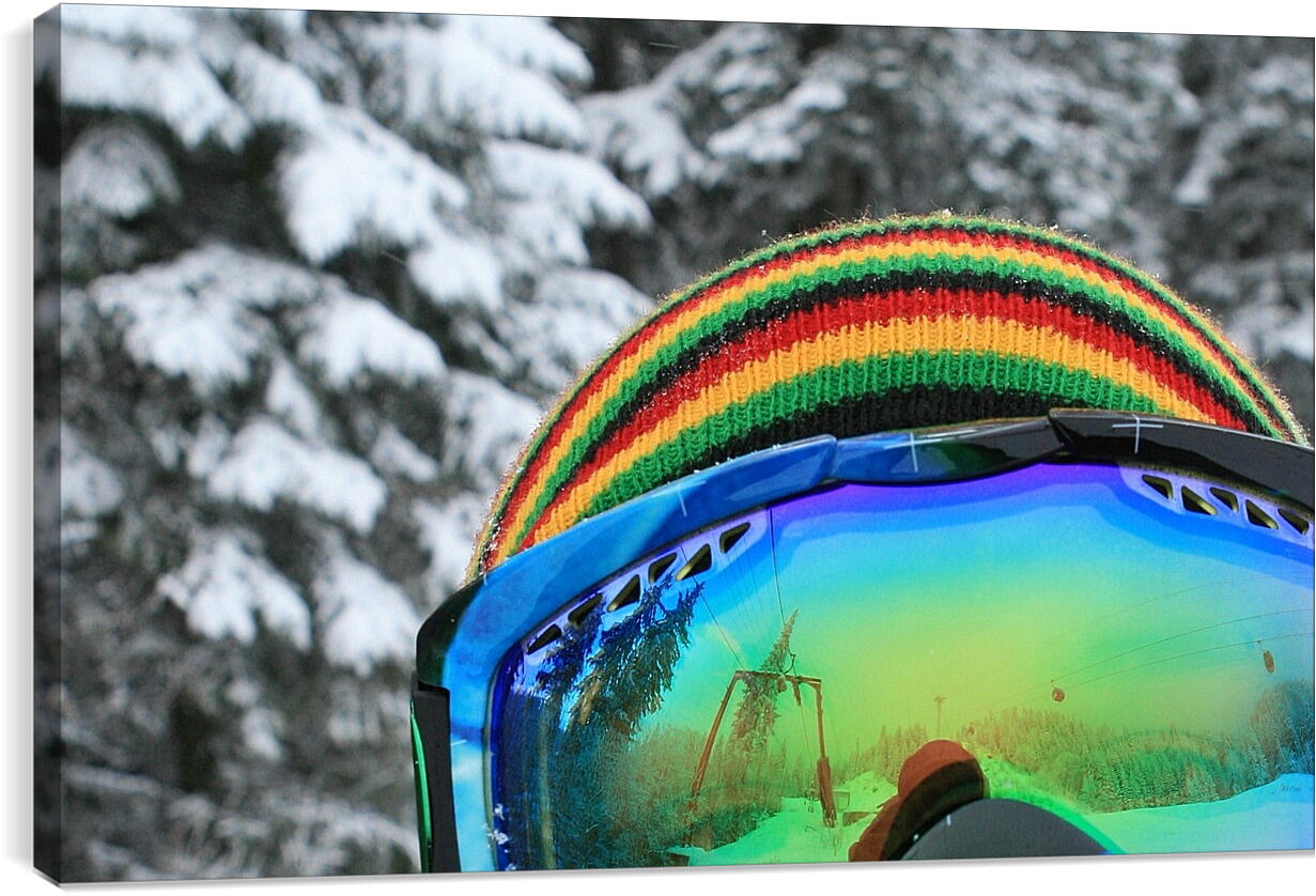 Постер и плакат - Сноубордист в разноцветной шапке и очках