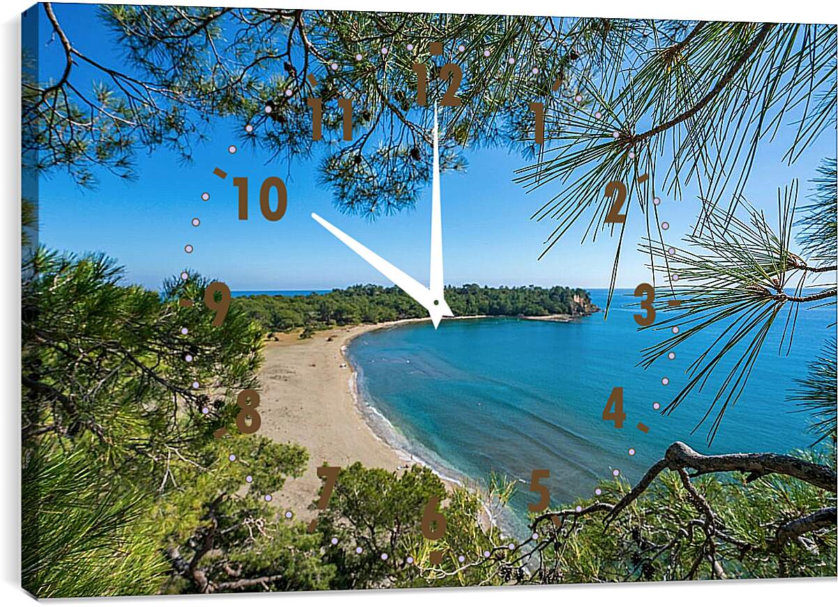 Часы картина - Вид на пляж и море через ветки
