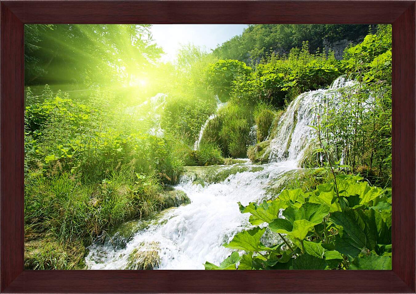 Картина в раме - Водопад в лесу под солнцем
