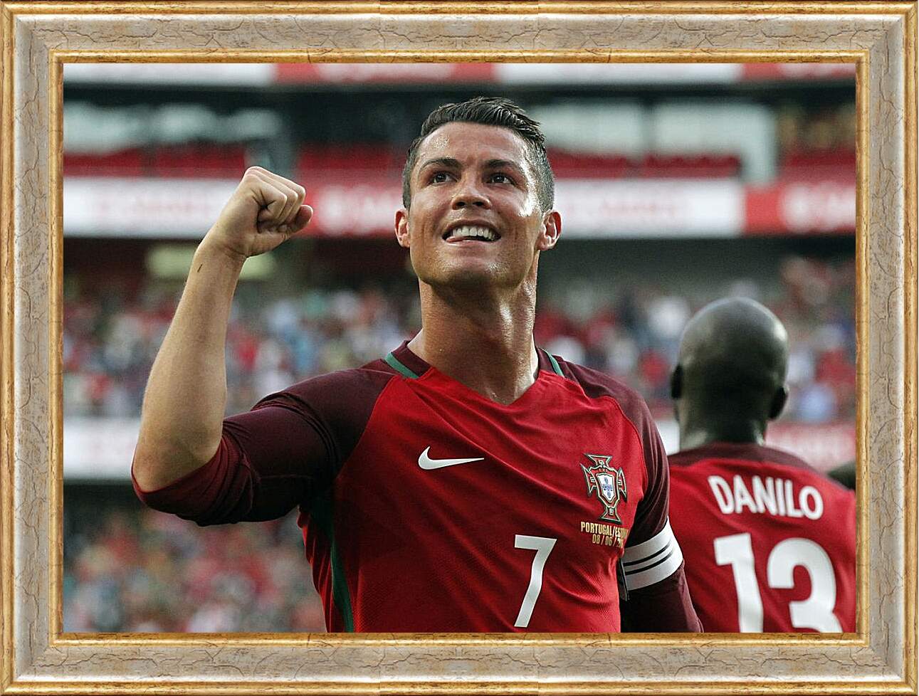Картина в раме - Криштиану Роналду в сборной Португалии.