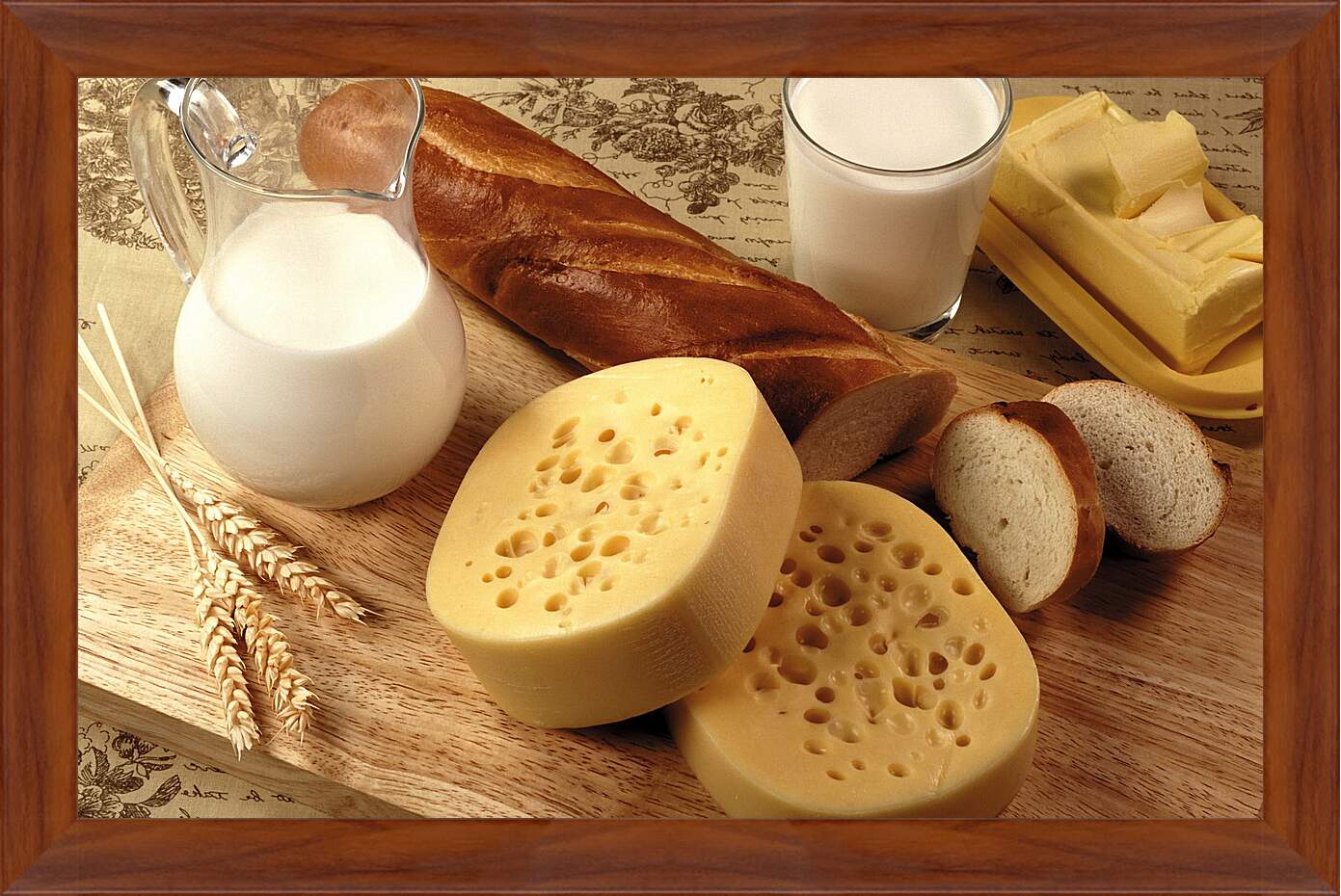 Картина в раме - Батон, сыр, кувшин и стакан молока на столе