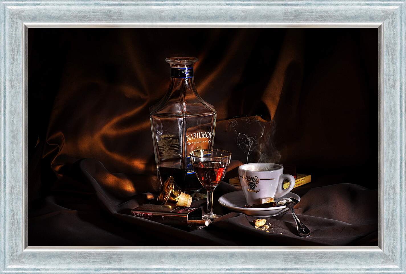 Картина в раме - Налитый бокал рядом с бутылкой и чашка на блюдце