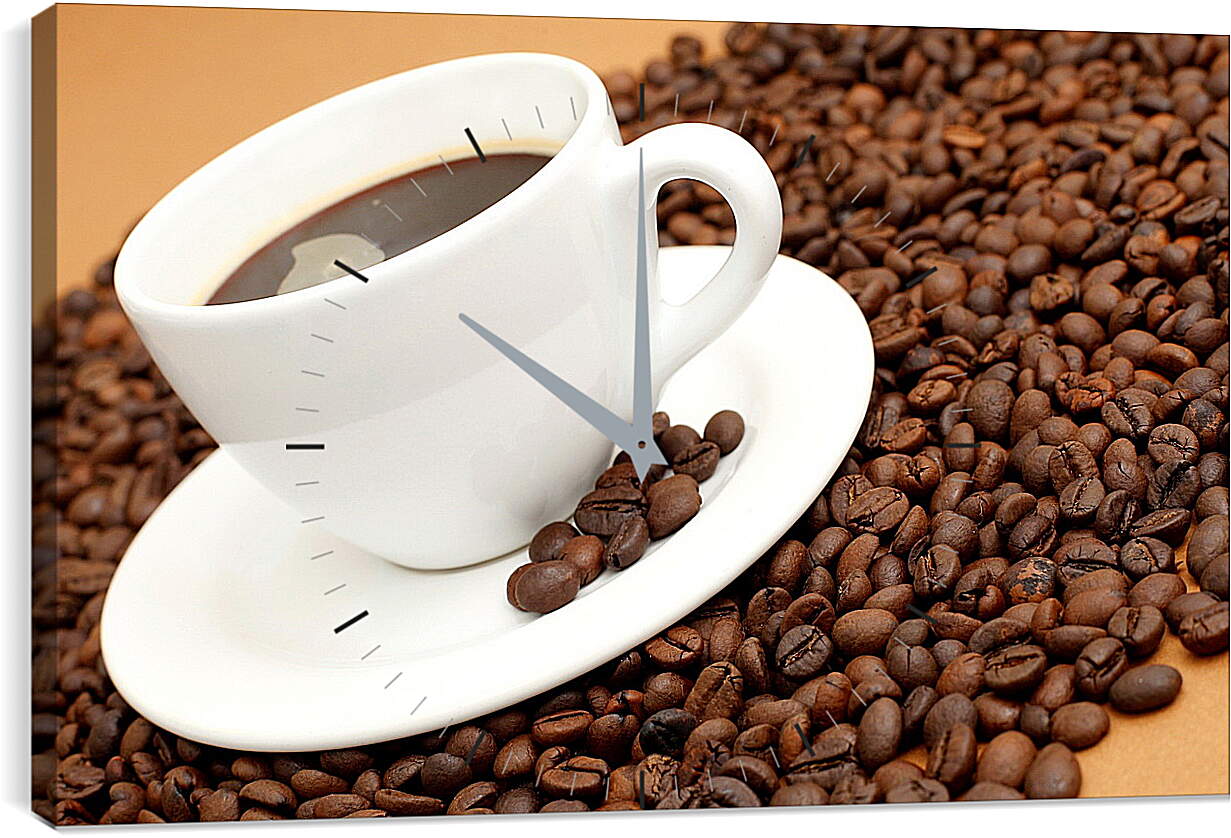 Часы картина - Блюдце с чашкой стоящие на зернах кофе